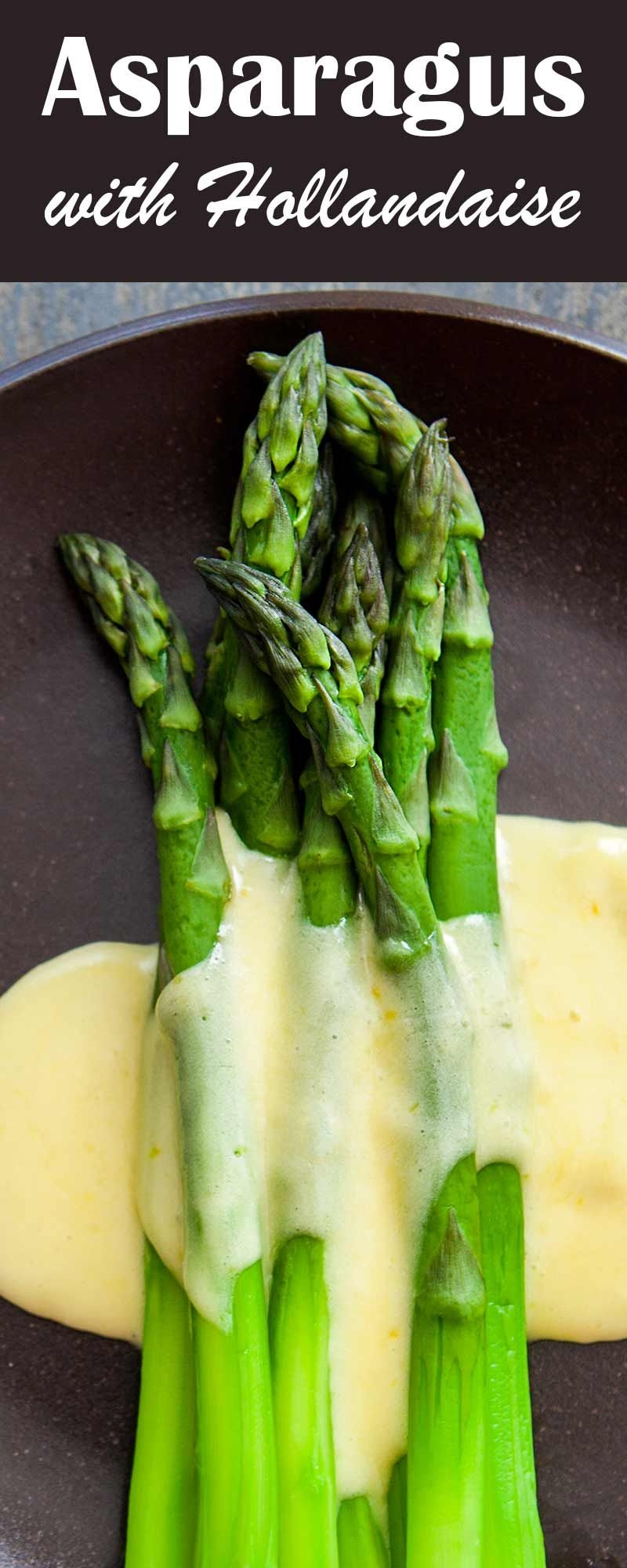 Elegant Steamed Asparagus Served With A Hollandaise Butter Sauce 